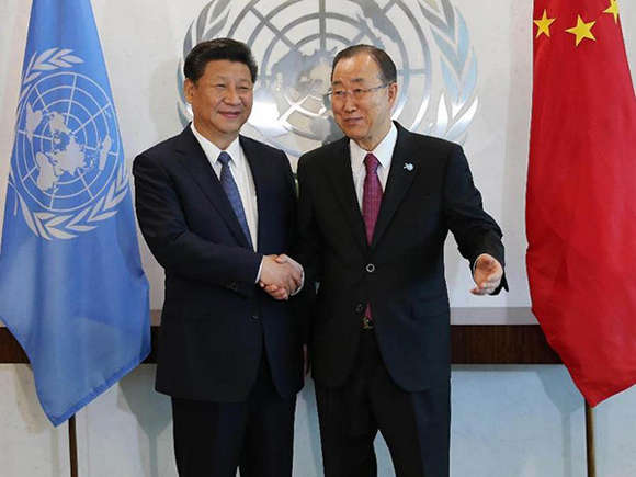 Chinese President Xi Jinping(L) meets with UN Secretary-General Ban Ki-moon at the UN headquarters in New York, Sept. 26, 2015.[Photo/Xinhua]