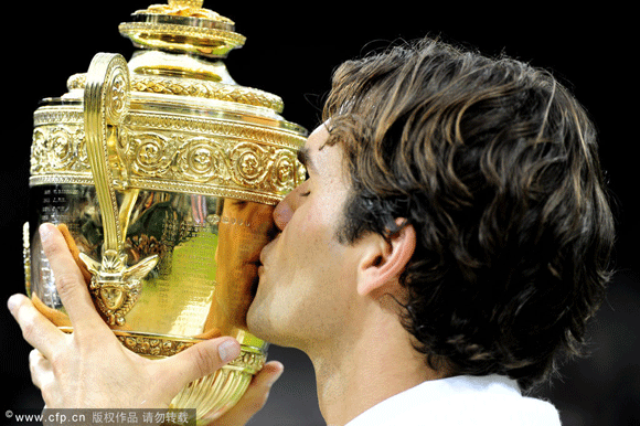 Sealed with a kiss: Federer is a master of his art.