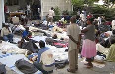Photo taken on Jan. 13, 2010 shows injured people in Haiti&apos;s capital Port-au-Prince.[Xinhua]