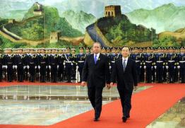 Chinese Premier Wen Jiabao (front R) holds a welcoming ceremony for visiting Jamaican Prime Minister Bruce Golding (front L) at the Great Hall of the People in Beijing, capital of China, Feb. 3, 2010. [Li Xueren/Xinhua]