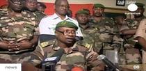 This TV grab image taken from Euronews channel shows Gokoye Abdul Karimou, spokesman for the millitary junta, delivering a televised statement in Niamey, February 19. Niger's new military rulers posted tanks and trucks mounted with machine guns around the presidential palace Friday after toppling strongman Mamadou Tandja and sacking the government in a deadly coup. (Xinhua photo) This TV grab image taken from Euronews channel shows Gokoye Abdul Karimou, spokesman for the millitary junta, delivering a televised statement in Niamey, February 19. Niger's new military rulers posted tanks and trucks mounted with machine guns around the presidential palace Friday after toppling strongman Mamadou Tandja and sacking the government in a deadly coup. (Xinhua photo)