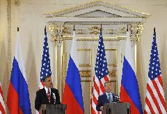 U.S. President Barack Obama (L) and his Russian counterpart Dmitry Medvedev attend a news conference after signing a landmark nuclear arms reduction treaty in Prague, capital of Czech Republic, on April 8, 2010. Under the new pact, the two countries agreed to reduce their deployed nuclear warheads to 1,550 each, or 30 percent below the current level of 2,200, and cut the launchers below 700 each.[Wu Wei/Xinhua]
