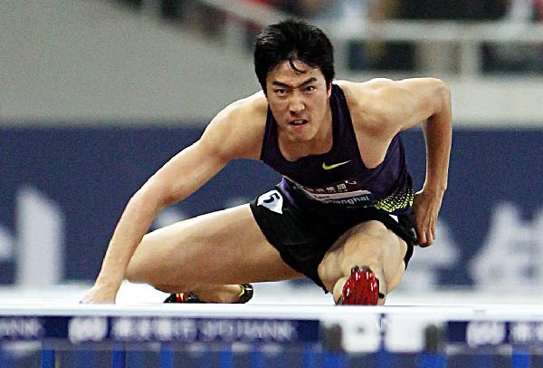 Liu Xiang of China competes during the men's 110m hurdles at the IAAF Diamond League athletic meeting in Shanghai, east China, May 23, 2010. Liu ranked the third with 13.40 seconds.(Xinhua/Fan Jun) 