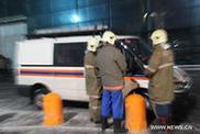  Emergency personnel stand outside the Domodedovo Airport in Moscow, capital of Russia, Jan. 24, 2011. At least 31 people were killed and over 130 others injured in an explosion at Moscow's Domodedovo airport on Monday, the Russian Health Ministry said. [Wei Dafang/Xinhua]