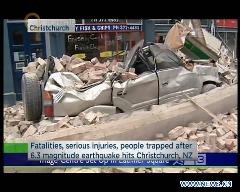 TV grab taken on Feb. 22, 2011 shows a damaged vehicle in Christchurch, New Zealand. A massive 6.3 earthquake hit New Zealand South Island's largest city of Christchurch for the second time in less than six months, causing multiple deaths and widespread destruction. [Xinhua] 