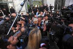 The lawyer of Italian Prime Minister Silvio Berlusconi, Giorgio Perroni (C), speaks to the press in front of Milan justice court during the first hearing of the 'Ruby the Heart Stealer' case's trial on April 6, 2011. Italian Prime Minister Silvio Berlusconi's trial on charges of sex with an underage prostitute, Karima El Mahroug, nicknamed 'Ruby the Heart Stealer', and abuse of power, opened and was immediately postponded by judges to May 31. The lawyer of Italian Prime Minister Silvio Berlusconi, Giorgio Perroni (C), speaks to the press in front of Milan justice court during the first hearing of the 'Ruby the Heart Stealer' case's trial on April 6, 2011. Italian Prime Minister Silvio Berlusconi's trial on charges of sex with an underage prostitute, Karima El Mahroug, nicknamed 'Ruby the Heart Stealer', and abuse of power, opened and was immediately postponded by judges to May 31.