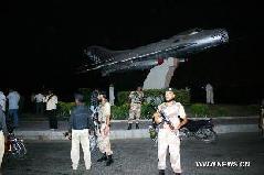 Pakistani troops arrive at the Pakistan military air base after an attack by militants in southern Pakistan's Karachi on May 23, 2011. At least four people were killed and one plane was destroyed following attacks launched by terrorists late Sunday night at a Pakistan air base in Karachi. [Toheed/Xinhua] 
