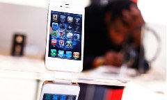 iPhones are among the Apple devices vulnerable to the software vulnerability reported in Germany. [Reuters]