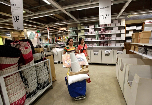 11 Furniture, as the store is known, copies IKEA's blue and yellow color scheme, mock-up rooms, signage and its rocking chair designs. 11 Furniture, as the store is known, copies IKEA's blue and yellow color scheme, mock-up rooms, signage and its rocking chair designs.