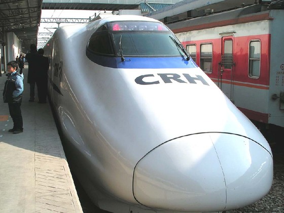 A high-speed train is seen at a railway station. A high-speed train is seen at a railway station.