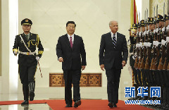 Xi hosted a red-carpet welcome ceremony for Biden, who is on his first official visit to China as U.S. vice president. 