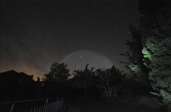 Mystery of glowing white ball in the sky.[Photo by an internet user in Beijing]