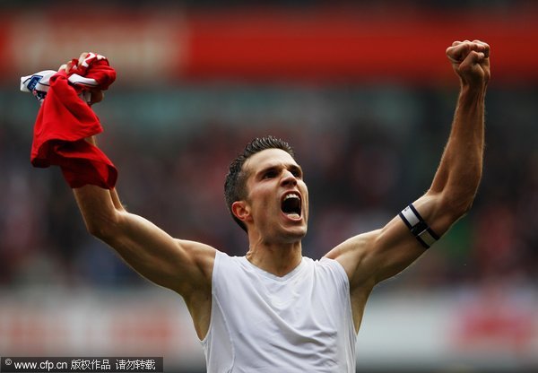 Robin van Persie of Arsenal celebrates as he scores their second goal during the Barclays Premier League match between Arsenal and Sunderland at the Emirates Stadium on October 16, 2011 in London, England. 
