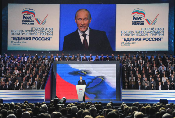 Prime Minister Vladimir Putin speaks during a United Russia party congress in Moscow, Russia, Sunday, Nov. 27, 2011. Prime Minister Vladimir Putin has been formally nominated by the ruling United Russia party to run for president in next March's election. 
