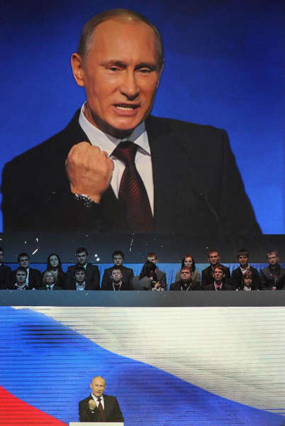 Prime Minister Vladimir Putin gestures as he speaks during a United Russia party congress in Moscow, Russia, Sunday, Nov. 27, 2011. Prime Minister Vladimir Putin has been formally nominated by the ruling United Russia party to run for president in next March's election.