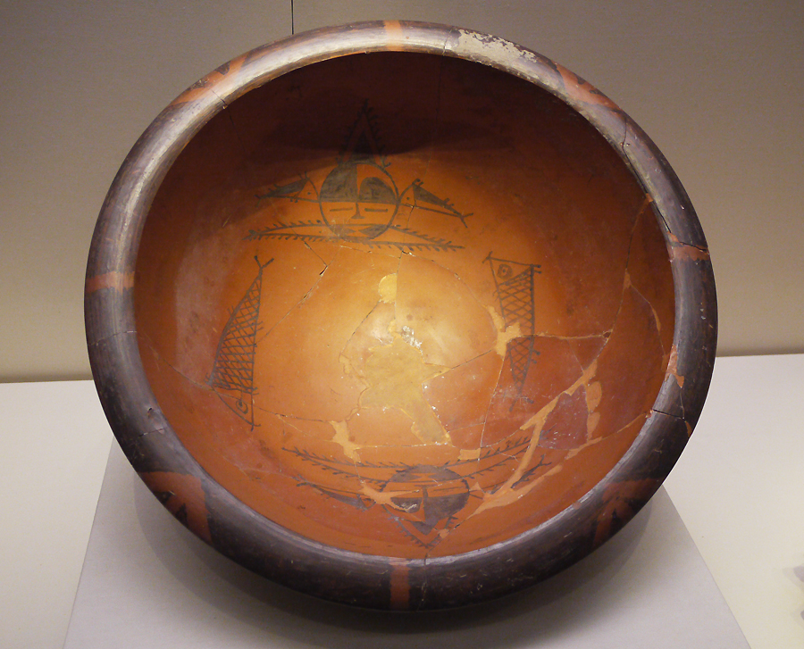 Painted Pottery Basin with Human Face and Fish Design, Yangshao Culture (c. 5000-3000 BC), unearthed at Banpo, Xi'an, Shaanxi Province, 1955. It is exhibited in the section of Life and Production in Neolithic China, an exhibition of Ancient China in the National Museum of China.[Photo by Xu Lin / China.org.cn]