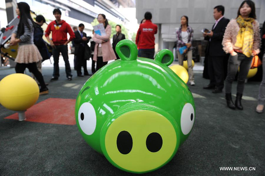 Visitors are seen at an Angry Birds outdoor theme park in Shanghai, east China, Oct. 31, 2012. The theme park, which is located in Tongji University, covers an area of about 200 square meters.
