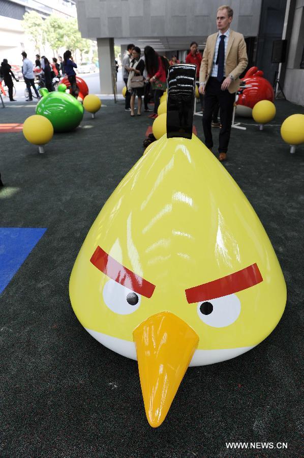 Visitors are seen at an Angry Birds outdoor theme park in Shanghai, east China, Oct. 31, 2012. The theme park, which is located in Tongji University, covers an area of about 200 square meters. 