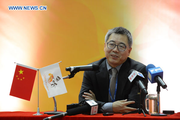 Su Wei, deputy chief of the Chinese delegation to the Doha conference, talks during a media briefing on the progress of the first week's conference at the China Pavilion in Qatar National Convention Center (QNCC) in Doha, Qatar, Dec. 1, 2012. [Li Muzi/Xinhua]