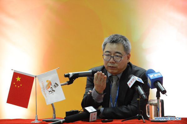 Su Wei, deputy chief of the Chinese delegation to the Doha conference, talks during a media briefing on the progress of the first week's conference at the China Pavilion in Qatar National Convention Center (QNCC) in Doha, Qatar, Dec. 1, 2012. 