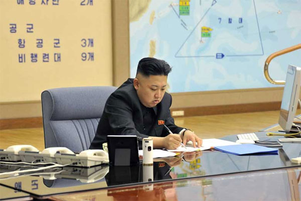 The KCNA news agency reports Kim Jong Un, top leader of the Democratic People's Republic of Korea (DPRK), has ratified a strike plan by the country's strategic rocket force at a meeting convened early on Friday, March 29, 2013. [Photo: Image China]