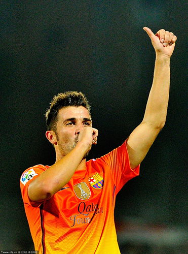 David Villa of FC Barcelona celebrates scoring their fourth goal during the La Liga match between Getafe CF and FC Barcelona at Coliseum Alfonso Perez on September 15, 2012 in Getafe, Spain.