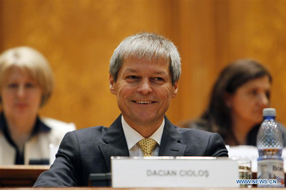 Romania's prime minister-designate Dacian Ciolos is seen at Romanian Parliament during the validation vote session in Bucharest, Romania, Nov. 17, 2015. [Photo/Xinhua]
